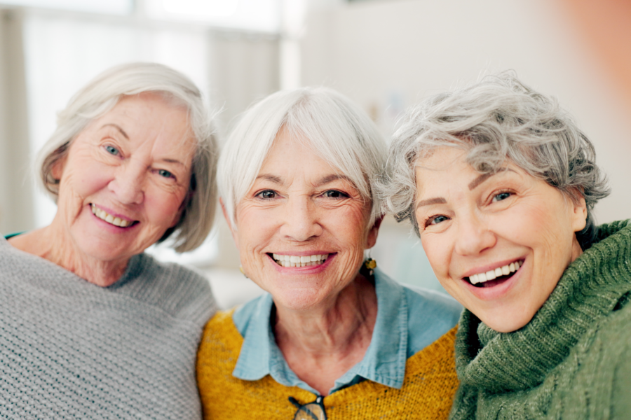 3 women smiling