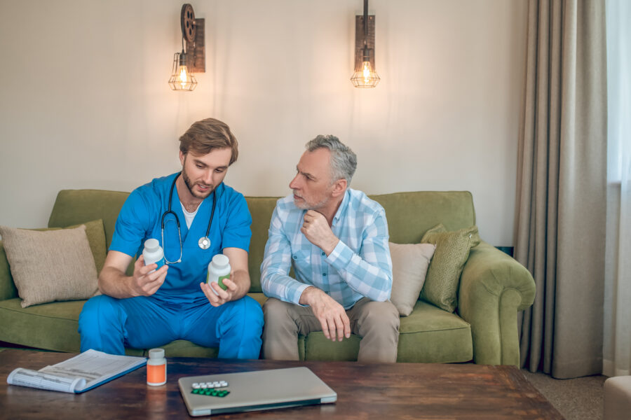 A senior getting in-home care service from a skilled nurse